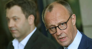 সরকারি চুক্তি স্বাক্ষরের পর মের্জ বলেছেন, জার্মানি ফিরে এসেছে