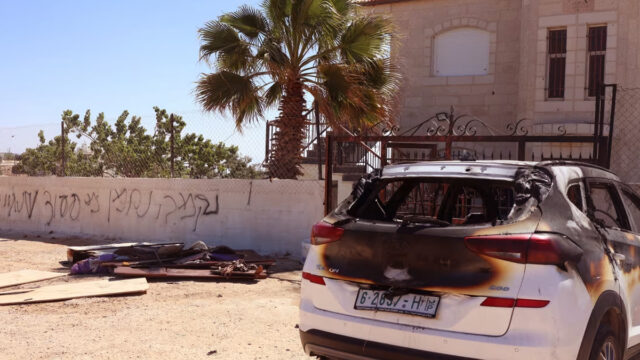 A Burnt Out Car After An Israeli Settlers Attack