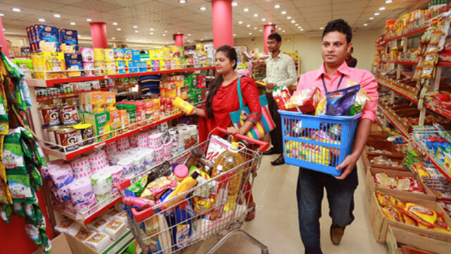A Family Shopping At A Supermarket