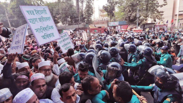 Police Use Batons And Water Cannon